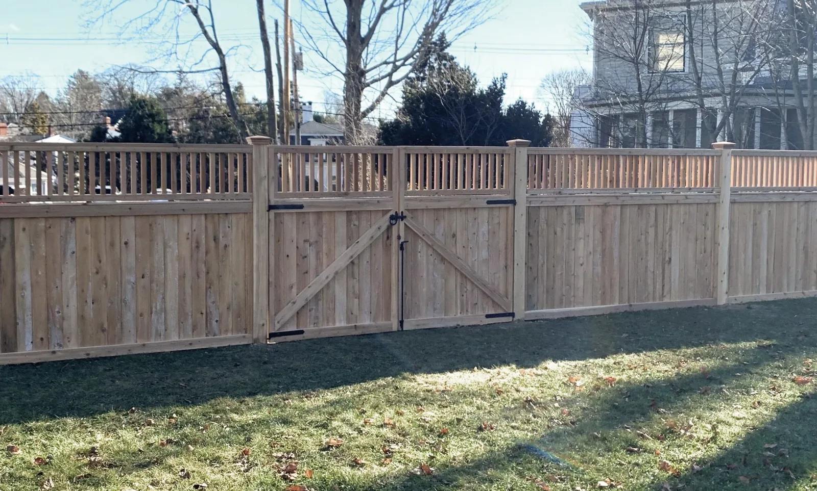 Cedar Fence with Double Gate project by Excalibur Fence and Iron Works