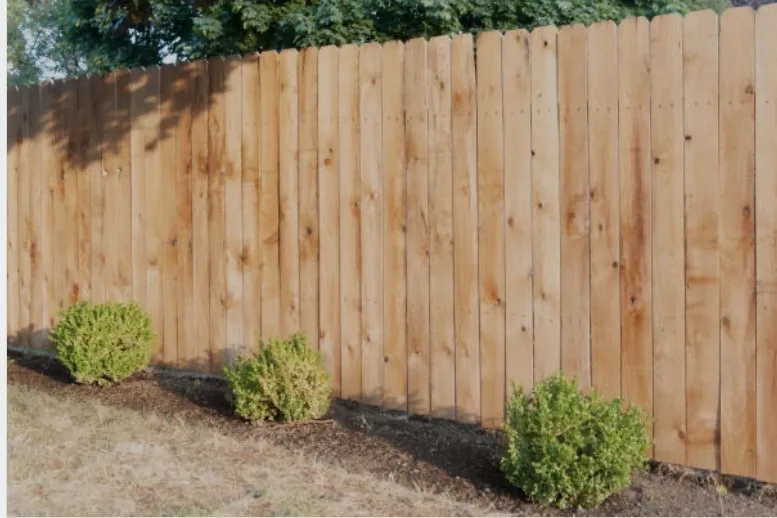 Stockade Wood Privacy Fence project by Excalibur Fence and Iron Works
