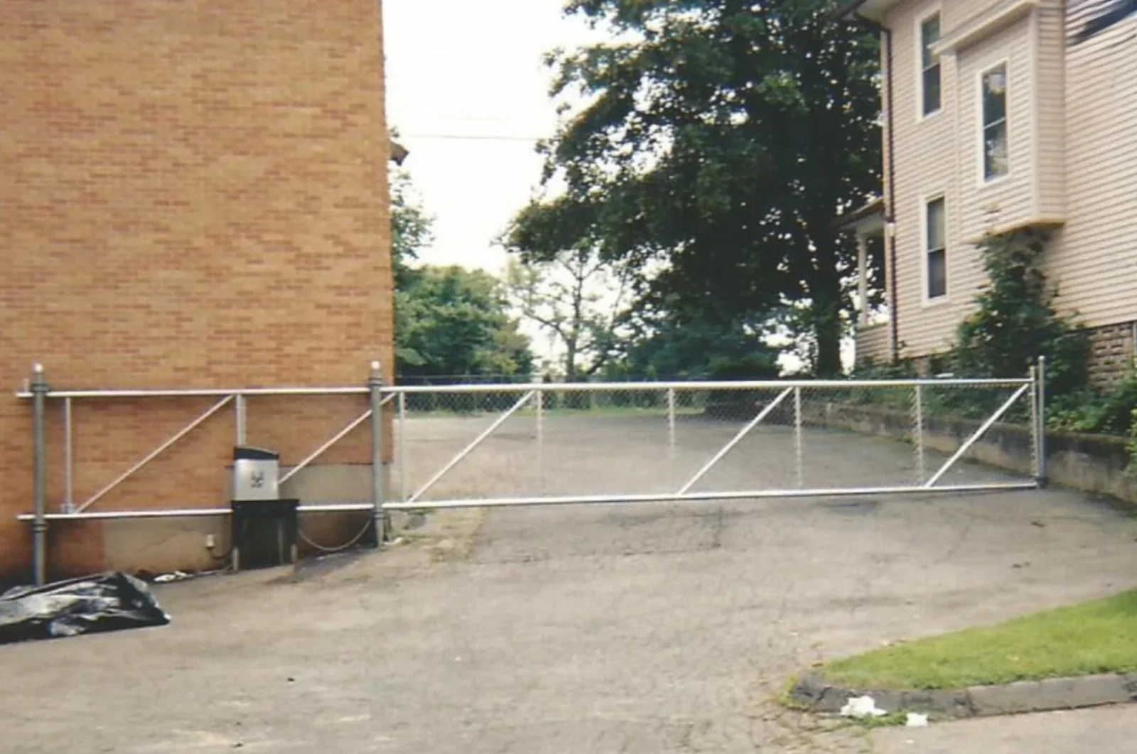 Galvanized Chain Link Rolling Driveway Gate project by Excalibur Fence and Iron Works