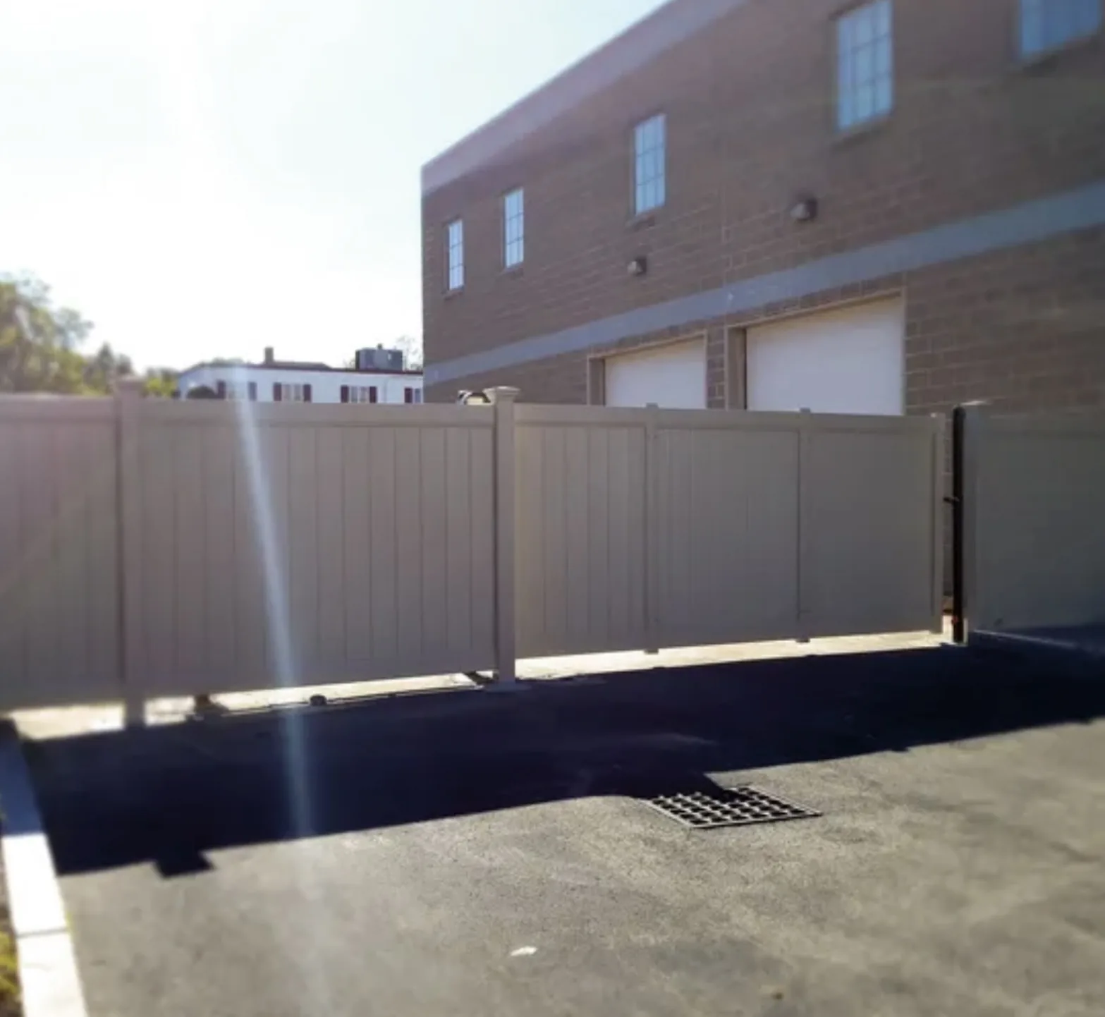 Commercial Vinyl Privacy Fence project by Excalibur Fence and Iron Works