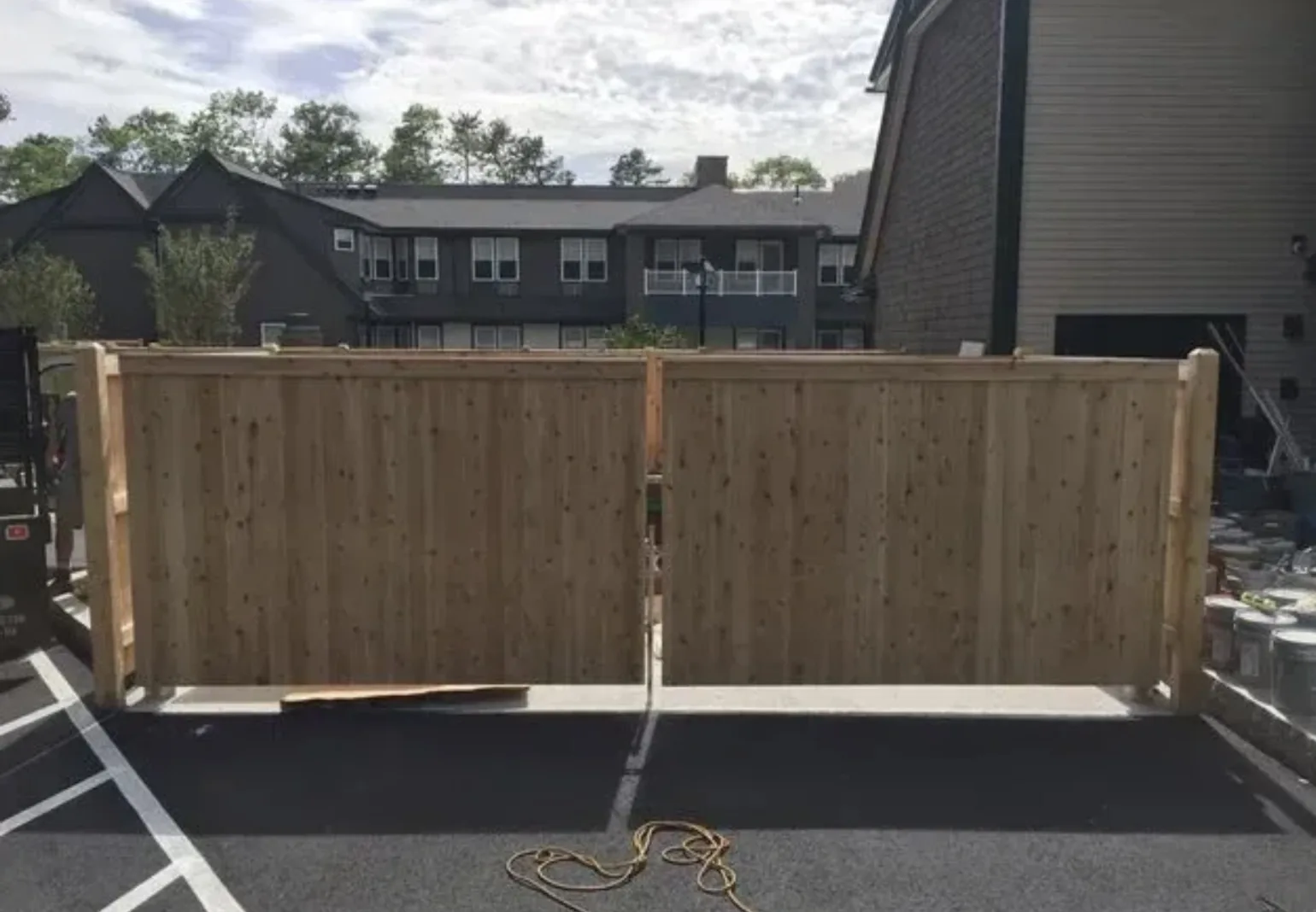 Custom Cedar Sliding Gate project by Excalibur Fence and Iron Works